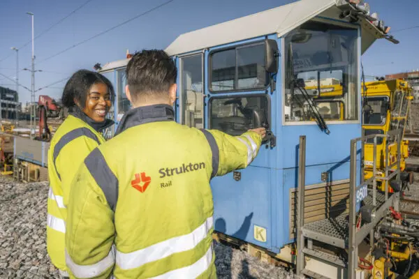 Womand and man and blue machine