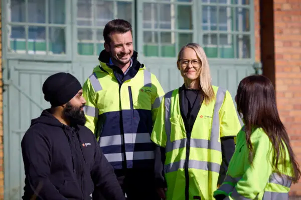 three women and one man